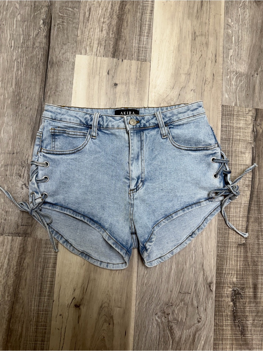 AKIRA Light Wash Lace-Up Side Denim Shorts